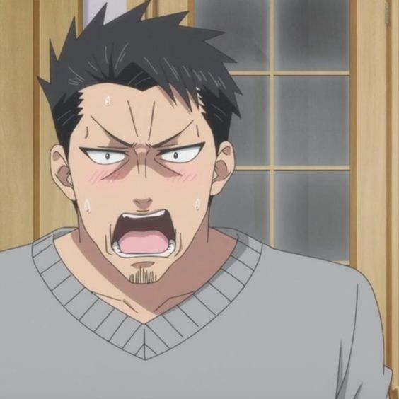 a portrait of an angry, flustered anime man yelling with his mouth open. he has short black hair, a five o'clock shadow, and rosy cheeks, conveying a mix of anger and embarrassment.  he wears a plain, gray vneck shirt. the background suggests he's indoors with a light wooden frame visible behind him.