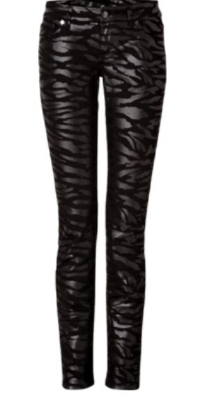 a pair of black skinny jeans with a tiger print pattern is shown in a full shot against a plain white background. the pants have a glossy, slightly reflective quality, making the tiger stripes stand out. the style is modern and could be described as edgy or fashionable.
