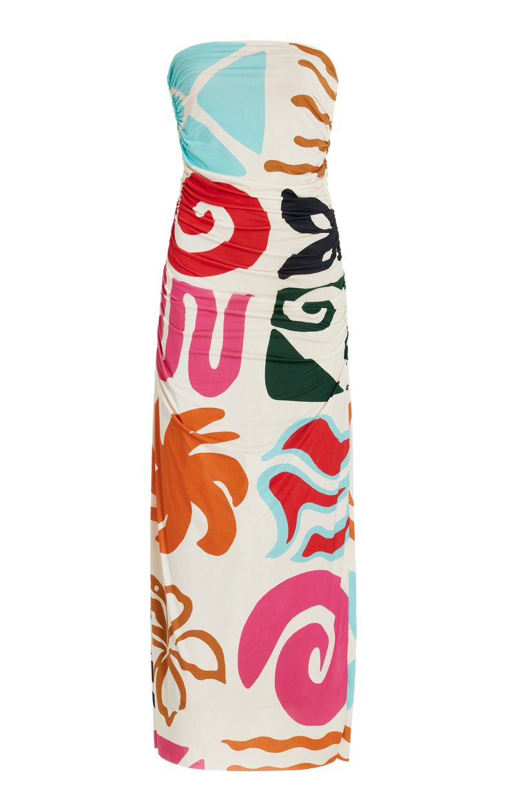 a white strapless maxi dress with a colorful abstract floral print. the dress is fitted and has a gathered waist. it is perfect for a summer party or cocktail event.