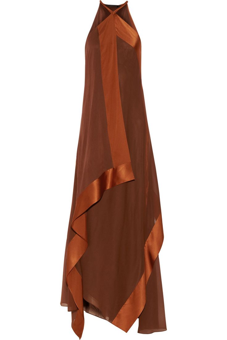 this is a brown silk halter dress with an asymmetrical design. it is sleeveless and has a long flowing skirt. the dress is elegant and would be perfect for a formal occasion.