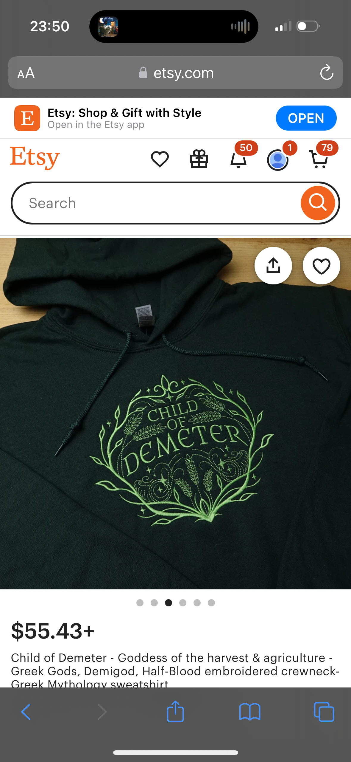 this is a picture of a product listing from the etsy website. the product is a black hoodie sweatshirt with green embroidery of the words "child of demeter" surrounded by vines and wheat stalks. the listing is for a halfblood embroidered crewneck sweatshirt inspired by greek mythology. the price is $55.43.