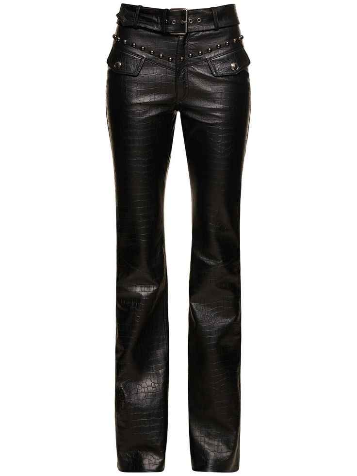 a pair of black faux leather pants for women. they are high waisted and have a studded belt and crocodile print. the pants are fitted in the thigh and then flare out to the bottom.