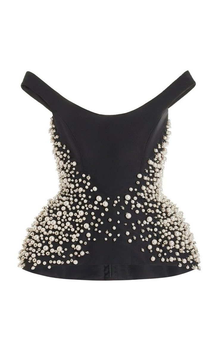 a black offtheshoulder peplum top is displayed on a white background. the top is heavily embellished with faux pearls.