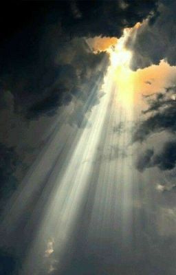 a breathtaking photograph of a beautiful sky filled with clouds and a heavenly beam of sunlight shining down. the image captures the aweinspiring beauty of nature, as the light illuminates the clouds and creates a sense of hope and inspiration.
