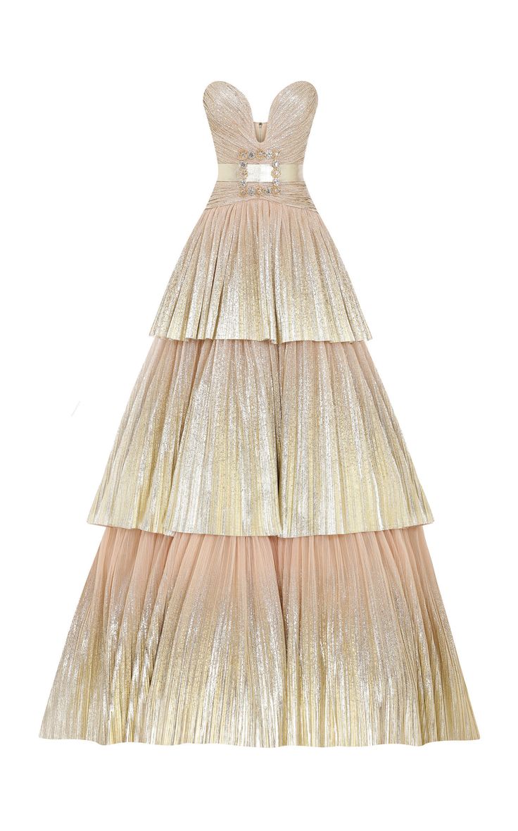 a strapless, tiered evening gown in gold and blush tones, adorned with sequins and pleats, and cinched with a belted buckle.