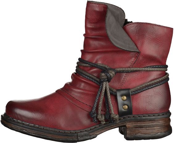 pair of women's red leather ankle boots with a laceup design is displayed. the boots are made of a reddishburgundy colored leather and have a slightly slouchy appearance. they feature a stacked heel, a rounded toe and are tied with multiple strands of dark brown and grey rope. the boots appear to be comfortable and stylish, suitable for casual wear in cooler weather.