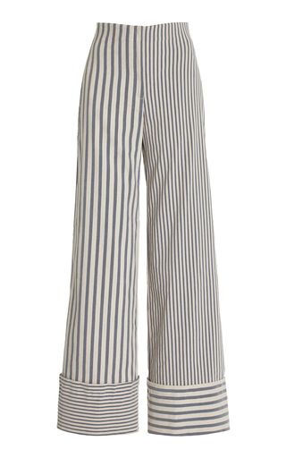 a pair of wideleg trousers with vertical stripes, featuring a cuff at the hem. the trousers appear to be highwaisted.