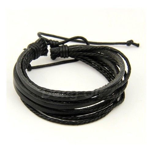 a black leather bracelet with multiple cords woven together. the bracelet is on a white surface, and the cords are woven in a intricate pattern. the bracelet is a simple but stylish accessory that would look great on any man.