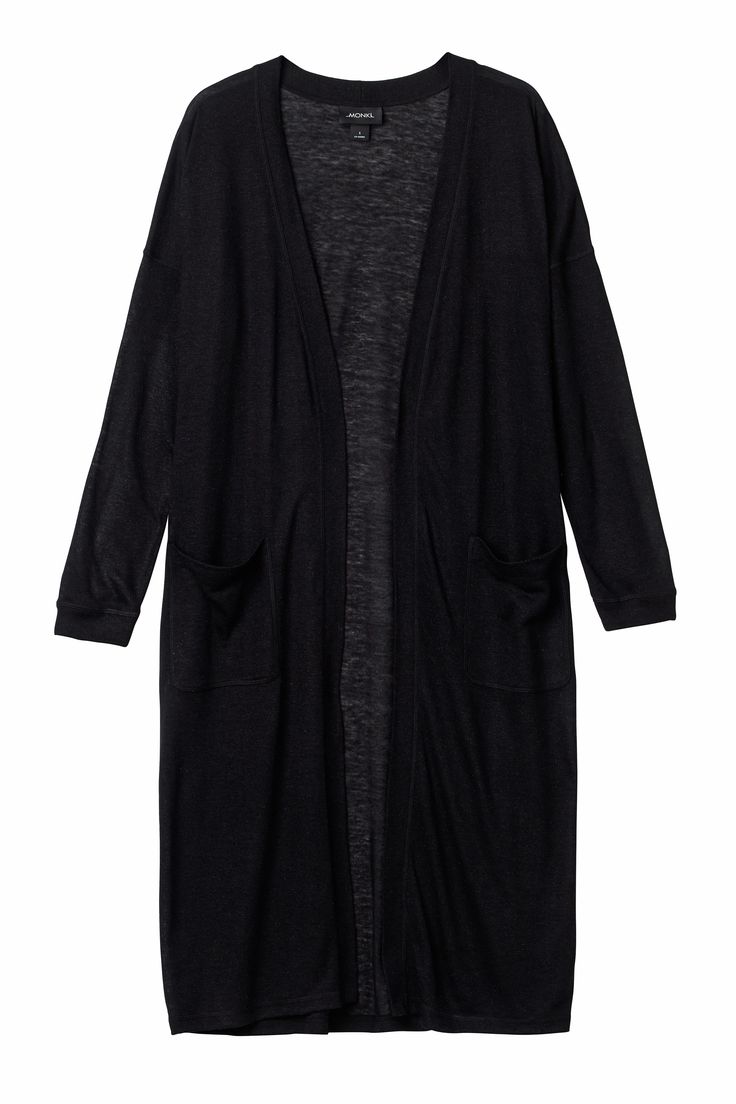 a long, black cardigan with long sleeves and two pockets.
