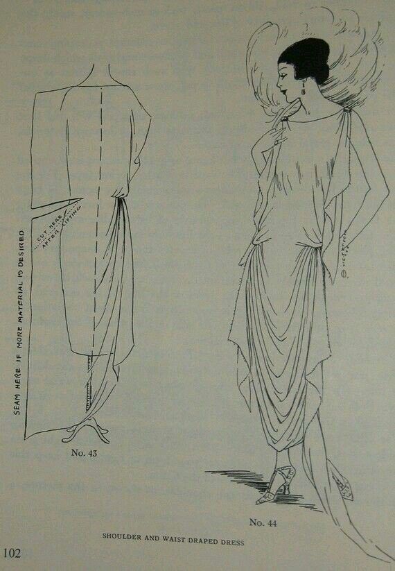 the image shows a vintage fashion illustration of a shoulder and waist draped dress, a style popular in the 1920s. the image consists of two drawings: the left is a schematic pattern diagram, and the right depicts a woman wearing the dress, complete with a feathered headdress and elegant shoes. the dress features a draped design at the shoulder and waist, flowing down to an asymmetrical hemline. the image has a retro aesthetic and is labeled with the numbers "no. 43" and "no. 44," likely indicating different versions or views of the same design. text labels include "seam here if more material is desired" and "cut here after lifting," suggesting it's a sewing pattern instruction.