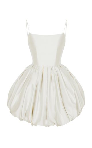 a white mini dress with spaghetti straps, a square neckline, and a bubble skirt. the dress appears to be made of satin or a similar shiny fabric.