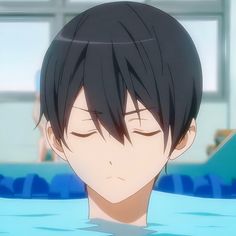 the image shows a closeup illustration of an anime boy with black hair in a swimming pool setting. he has his eyes closed, conveying a sense of tranquility and relaxation. the soft lighting and blue color palette further enhance the peaceful atmosphere.