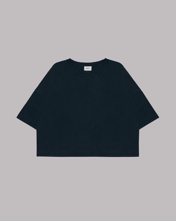 a front view of a black oversized crew neck tshirt on a white background. the tshirt has a plain design, with a simple crew neckline and no graphics or embellishments. the sleeves are long and wide, adding to the oversized feel. the fabric looks soft and comfortable, making this tshirt perfect for a casual look.