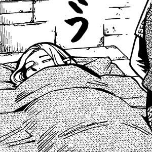 a black and white manga panel depicts a woman asleep under a blanket in a bed.  only her head and shoulders are visible, and she appears to be resting peacefully.  the style is typical of manga artwork, with detailed shading and linework. part of another person's clothing is visible in the upper right corner. a sign with japanese characters is visible behind the sleeping woman's head. the setting seems to be somewhat austere.