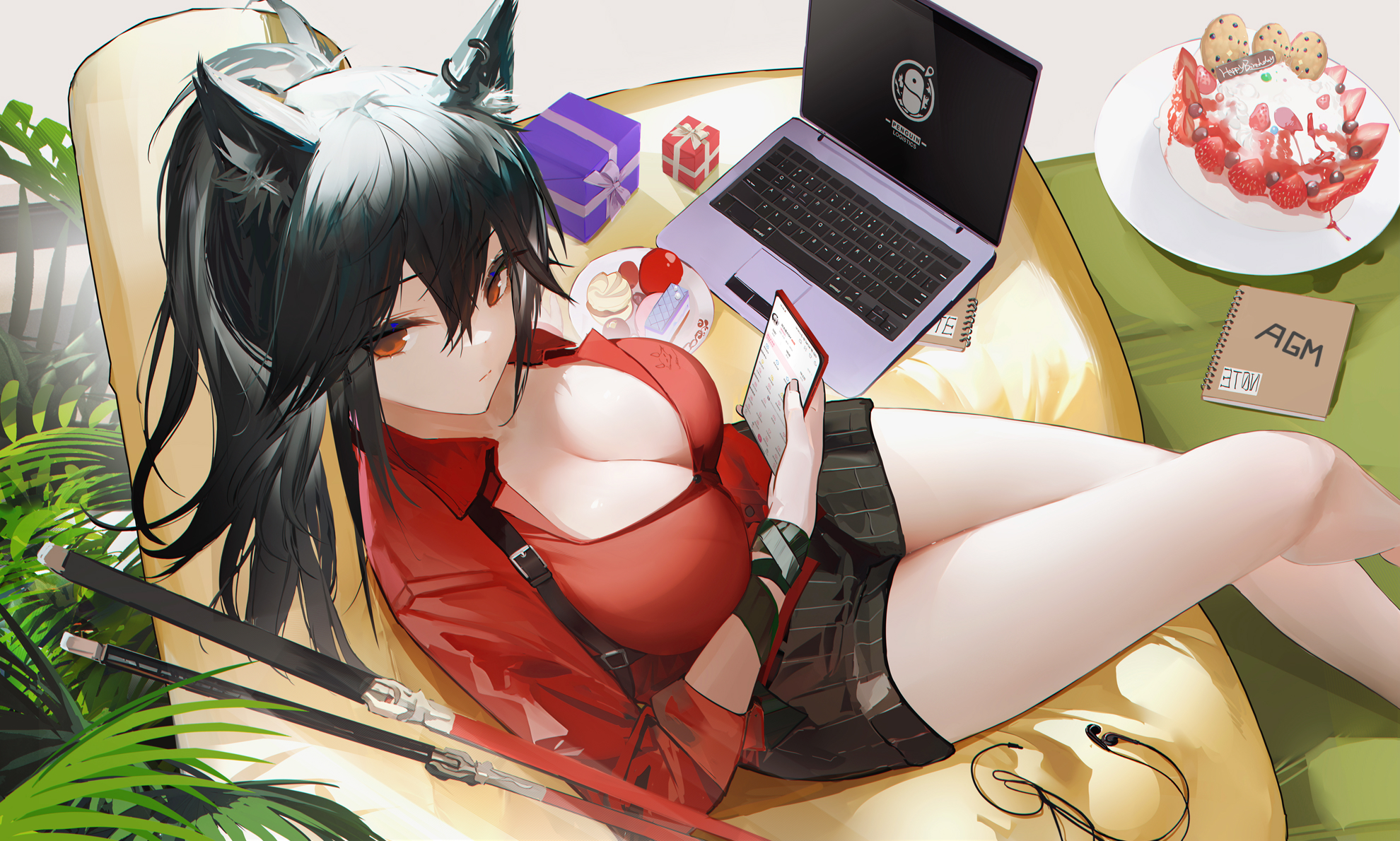 the image shows an anime girl with black hair and cat ears, wearing a red shirt and short black skirt. she is sitting comfortably on a yellow beanbag chair, using her smartphone while a laptop is on the chair next to her. there's a cake, gifts, and a notebook on the table. the overall mood is casual and relaxed. the art style is digital and highly detailed.