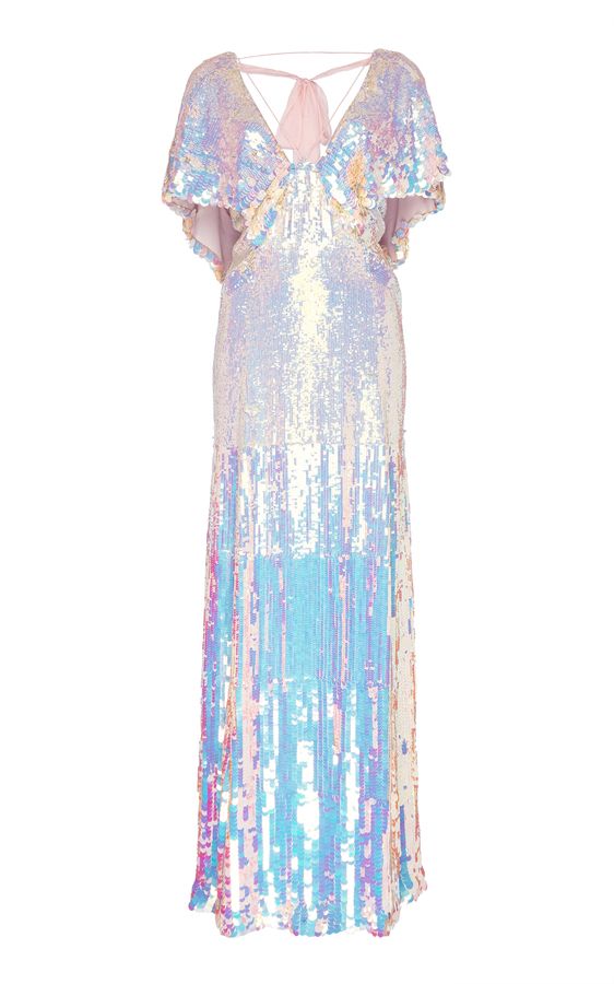 a long sequin dress that shimmers in a rainbow of colors. the dress is sleeveless with a vneck and a high slit. it is perfect for a formal occasion or a night out.