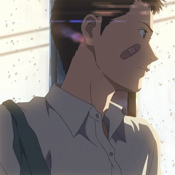 the image shows the side profile of a young, animated man. he's framed against a window, which features rain streaking down the glass.  the lighting suggests a soft, natural light source, perhaps filtered through clouds.  he has a contemplative expression on his face.  he is wearing a white buttondown shirt and what appears to be a green bag strap over his shoulder. he also has a bandaid on his right cheek.