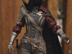 the image showcases the torso of a woman garbed in ornate, dark fantasy armor. she stands against a backdrop of warmtoned wooden planks, suggesting an indoor setting.  her attire, a mix of dark leather and metal, features intricate embroidery and a long, flowing cloak.  a sword hangs at her hip, and she holds a dagger in her left hand. the lighting is soft, casting subtle shadows that accentuate the textures of her clothing and weaponry. her face, concealed by a dark hood, adds to the air of mystery and strength.