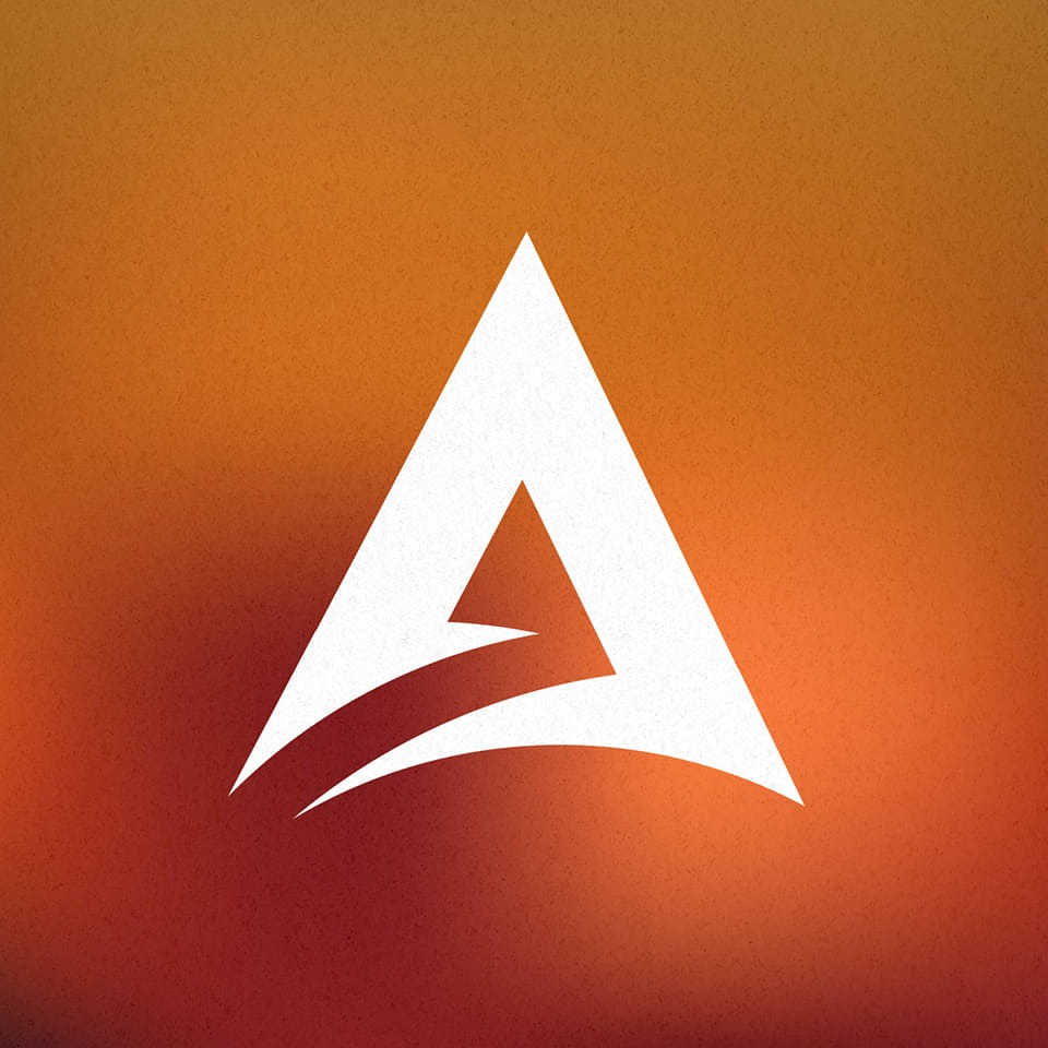 a white stylized letter "a" on a blurry orange and red background. the "a" has a pointed top with a curved line cutting through the middle, creating a sense of movement.