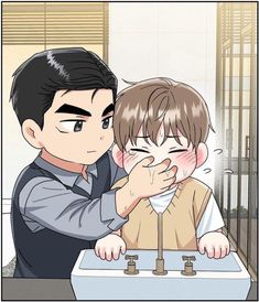 the image depicts a scene from a manga or manhwa (korean comic). it features two male characters, an adult and a young boy, in what appears to be a bathroom setting. the adult male, with dark hair and a concerned expression, is gently holding the boy's face and covering his mouth. the boy has flushed cheeks and appears distressed, with tears welling up in his eyes. they are positioned in front of a white sink. the overall style suggests a genre like yaoi or boys' love, which focuses on romantic relationships between male characters.