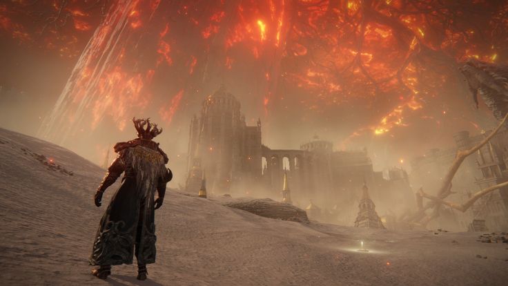 a screenshot from the video game elden ring depicts a desolate snowy landscape. in the foreground, a player character, clad in dark armor and a flowing cape with horns, stands with their back to the viewer.  the background showcases a large, ruined castle under a dramatic, fiery, apocalyptic sky.  giant, skeletallike structures seem to emerge from the sky, adding to the sense of destruction and impending doom. the overall atmosphere is dark, foreboding, and highly stylized.