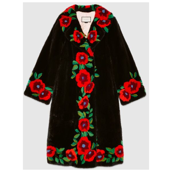 this image showcases a luxurious longsleeve black fur coat adorned with vibrant red poppy flower embroidery. the intricate floral pattern runs along the collar, down the front, and around the sleeves, creating a striking contrast against the dark fur. the coat, likely a highend designer piece, exudes an air of elegance and sophistication. the meticulous embroidery and rich fabric suggest a highquality garment.