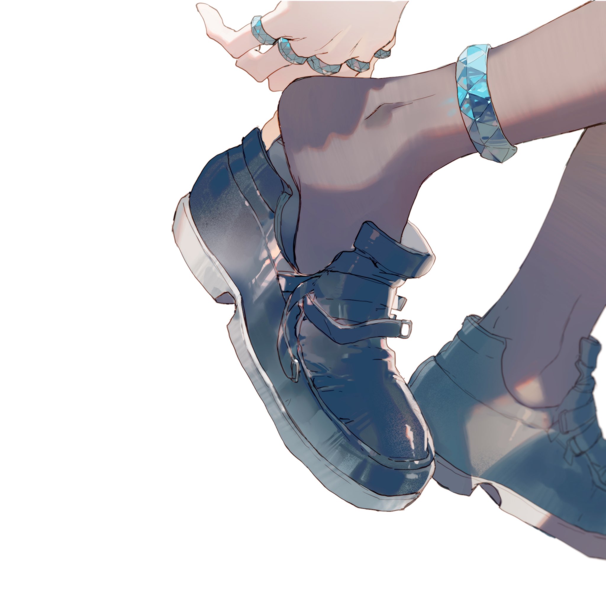 the image shows a pair of shiny black shoes, possibly loafers, with thick white soles. there are also some accessories, including a beaded anklet around the ankle and multiple rings on a hand. the background is white, and the overall image is clean and minimalistic.
