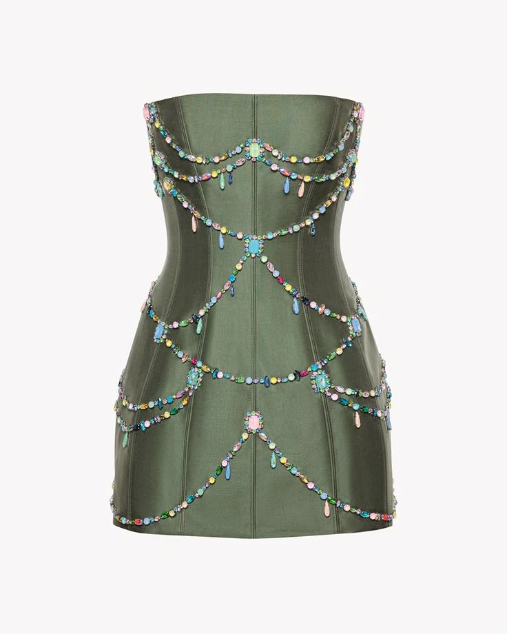 a green strapless mini dress is adorned with multiple strands of colorful beads and jewels. the dress is formfitting and has a bodycon silhouette. the beads and jewels are arranged in cascading lines across the dress.