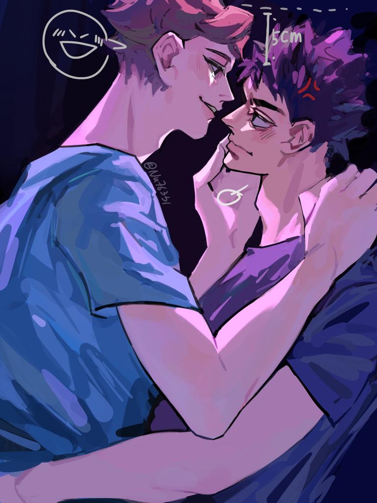 two anime boys are shown embracing each other