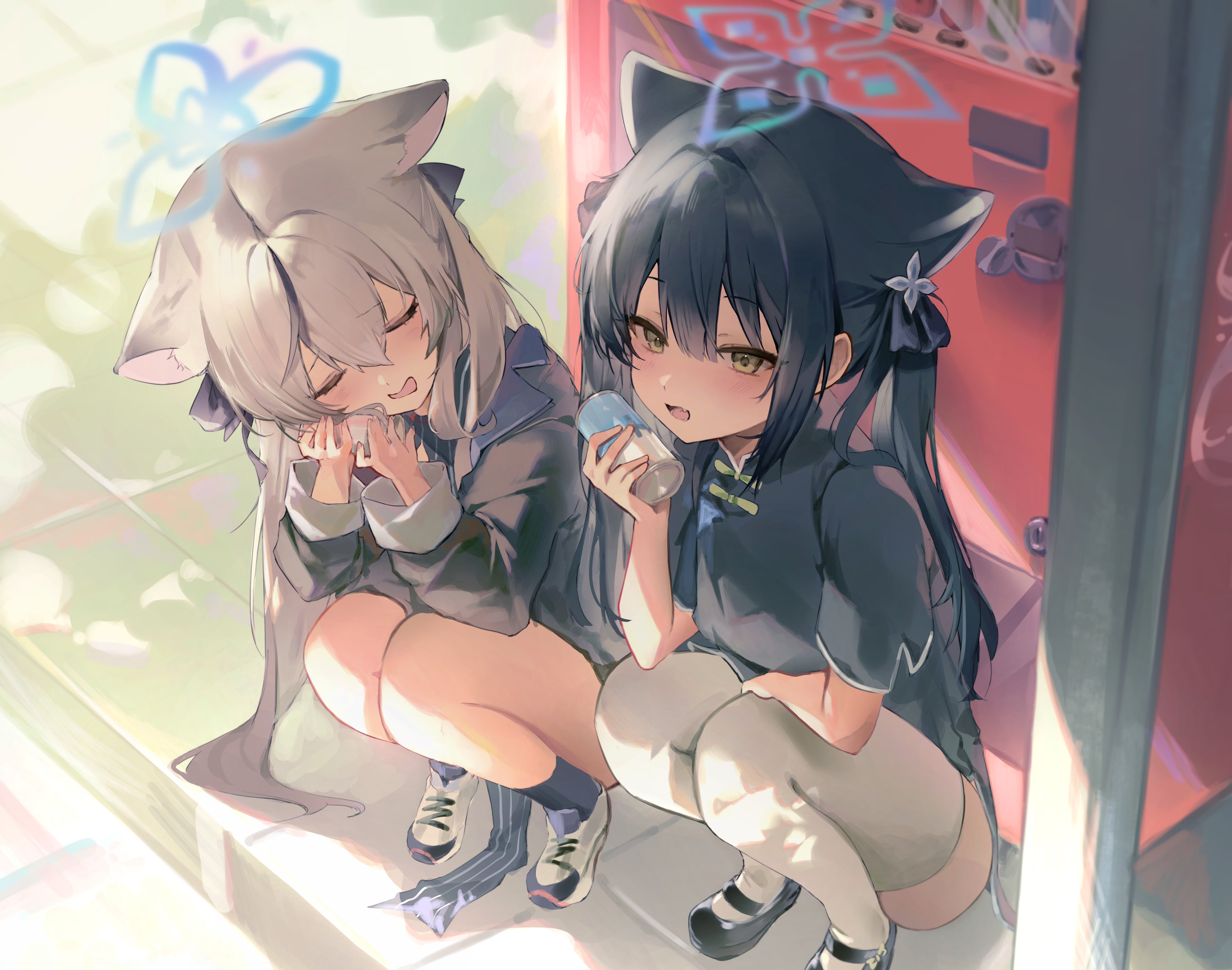 he image shows two anime girls sitting next to each other. the girl on the left has long grey hair and cat ears, and is wearing a school uniform. she is covering her face with her hands and appears to be shy or happy. the girl on the right has long black hair and cat ears, and is wearing a dark blue dress. she is holding a bottle of milk and is looking at the viewer. the two girls are sitting in a brightly lit area, possibly outdoors. the artwork is digital and has a soft, pastel color palette.