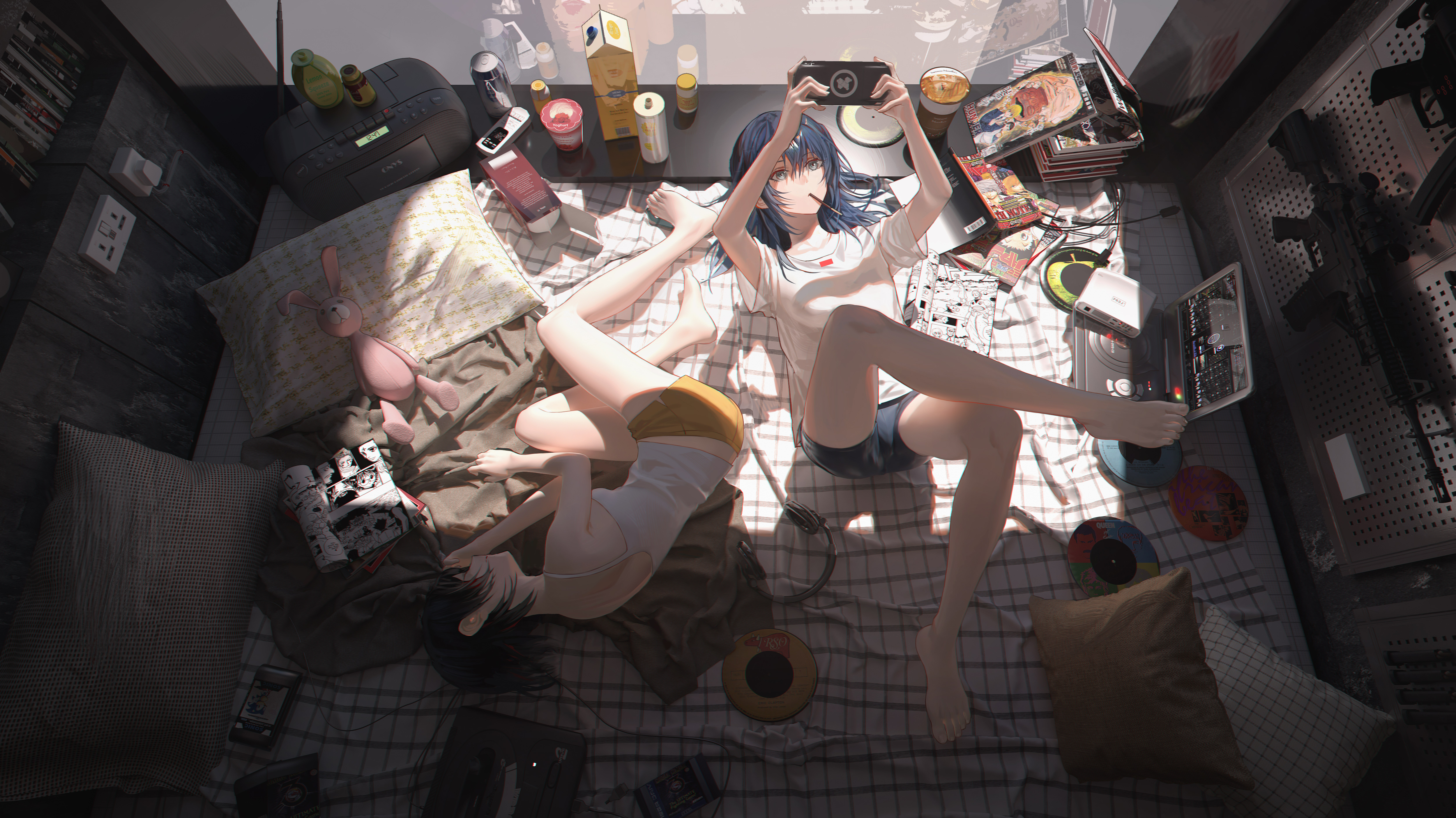 the image depicts two anime girls lying on a bed in a sunlit room. they're surrounded by various items, including video games, music records, a laptop, headphones, a stuffed animal, and various drinks and snacks. the room is slightly messy but gives a comfortable, relaxed atmosphere. the girls appear to be relaxed and enjoying each other's company. the overall style is casual and carefree.