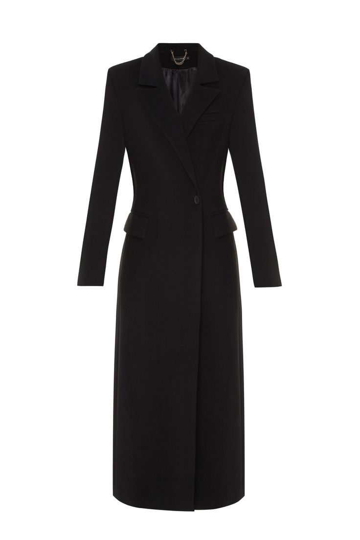 a black wool coat with long sleeves and double breasted closure. it is fitted and has a collar with lapels. the coat also has two pockets at the front and a hem that falls below the knee. it is styled on a model and isolated on a white background.