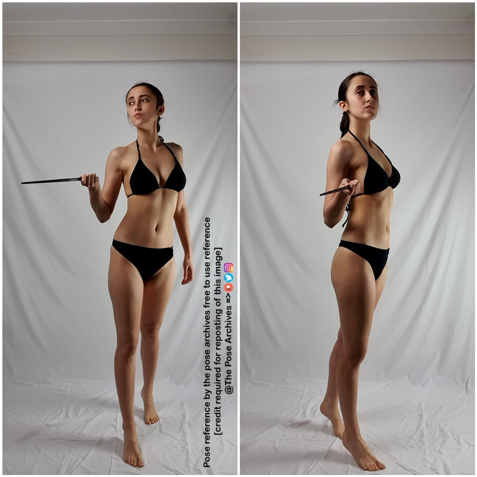 a young woman in a black bikini stands against a white background, holding a wand in her right hand. she is looking offcamera to the left, with a confident and casual expression.  she is posed for a reference photo. the lighting is soft and diffused, creating a natural look. the image is taken from eye level, providing a clear view of her full body.