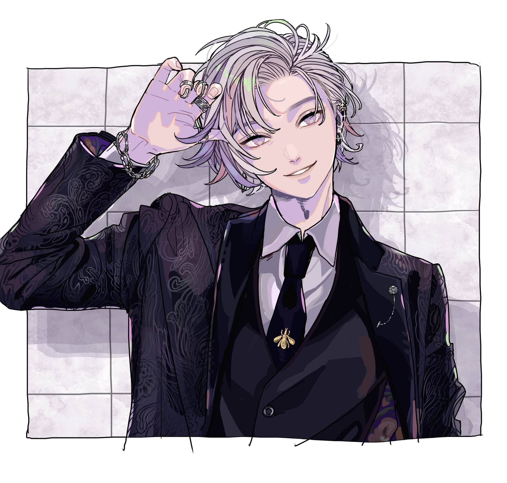 an anime style drawing of a male character with light gray hair, lavender eyes, and wearing a black suit with a tie, a bee pin on the vest, a ring on his finger, a chain bracelet, and earrings. he is smiling slightly and the background appears to be a white wall. the blazer has a detailed paisleylike pattern.