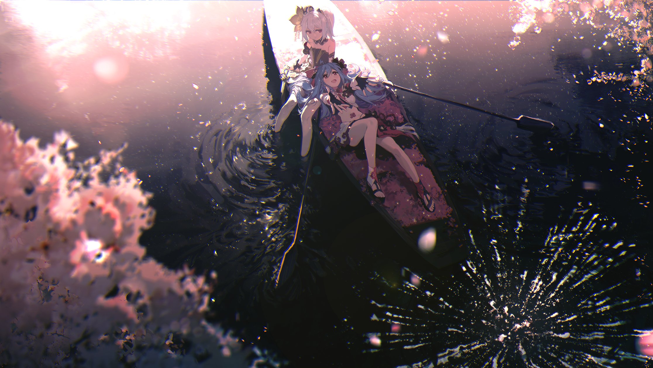 two anime girls are on a boat in the water. one is lying down, while the other is sitting behind her. they have a paddle, and there are cherry blossoms around them. the sun is shining on the scene, and there are ripples in the water. the girl lying down is wearing sandals and a dress, and they both have hair ornaments.