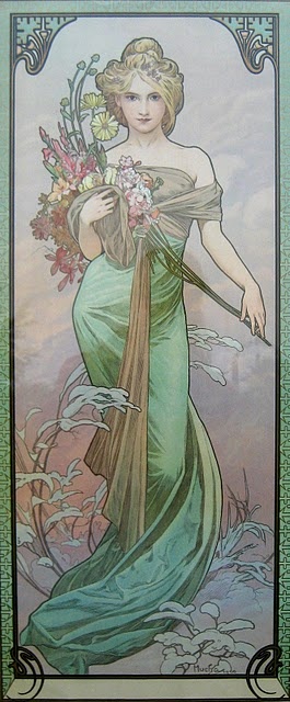 a vintage art nouveau poster in the style of alphonse mucha features a serene woman holding a bouquet of flowers. she is dressed in a flowing green dress, and a ribbon drapes across her body. the woman's blonde hair is styled up, and she has a gentle expression. the artwork is characterized by its pastel colors, floral decorations, and decorative border. the composition is allegorical and romantic, evoking a sense of nature and ethereal beauty.