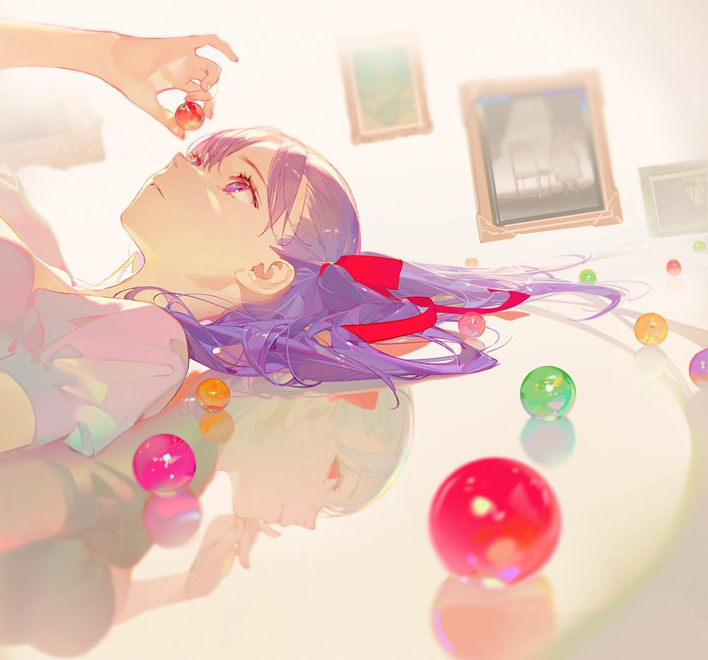 an anime girl with purple hair and a red ribbon lies on a reflective surface surrounded by colorful orbs. her reflection is visible on the surface. a hand holds a red orb above her face. picture frames hang in the background, slightly blurred. the art style is dreamlike, with light colors and smooth shading.