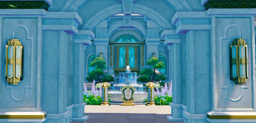 the image is a screenshot from the video game the sims 4, showcasing a meticulously designed building. the structure is predominantly teal or light blue, with gold accents on the architectural details.  the scene depicts a grand, symmetrical courtyard with a central fountain, surrounded by lush plants and flowers.  the entrance is framed by tall, ornate pillars, and art decostyle lamps are mounted on the walls. a gold plaque or award stands prominently in front of the fountain. the overall style is opulent and elegant, suggesting a palace or stately home. the perspective is from within the archway, looking towards the courtyard and fountain.