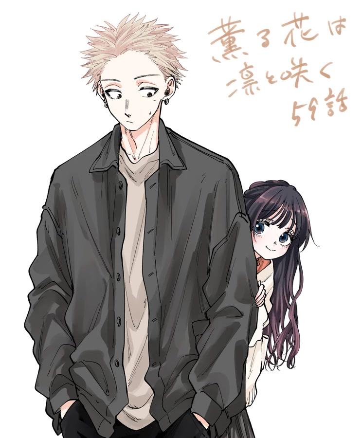 the image is a digital drawing in anime/manga style. it depicts a young man with blonde, spiky hair wearing a dark gray jacket and light beige shirt, standing slightly angled away from the viewer. behind him and partially hidden by his body is a shorter girl with long, dark hair, looking shy and happy. the girl seems to be slightly hugging the boy. japanese text is visible in the upper right corner of the image, likely a title or caption. the overall style is soft, sweet, and romantic. the artwork has a somewhat chibilike quality to it.