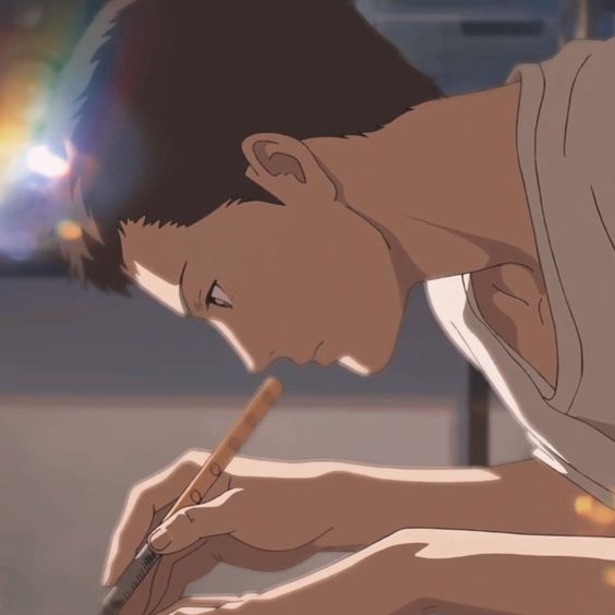 the image showcases a young man deeply engrossed in his drawing. he is depicted in profile view, his gaze intensely focused on the paper beneath his hand, which holds a sharpened pencil. the soft lighting creates a gentle ambiance, highlighting the delicate line work and shadows of his profile. the overall atmosphere suggests a moment of quiet concentration and creative flow.