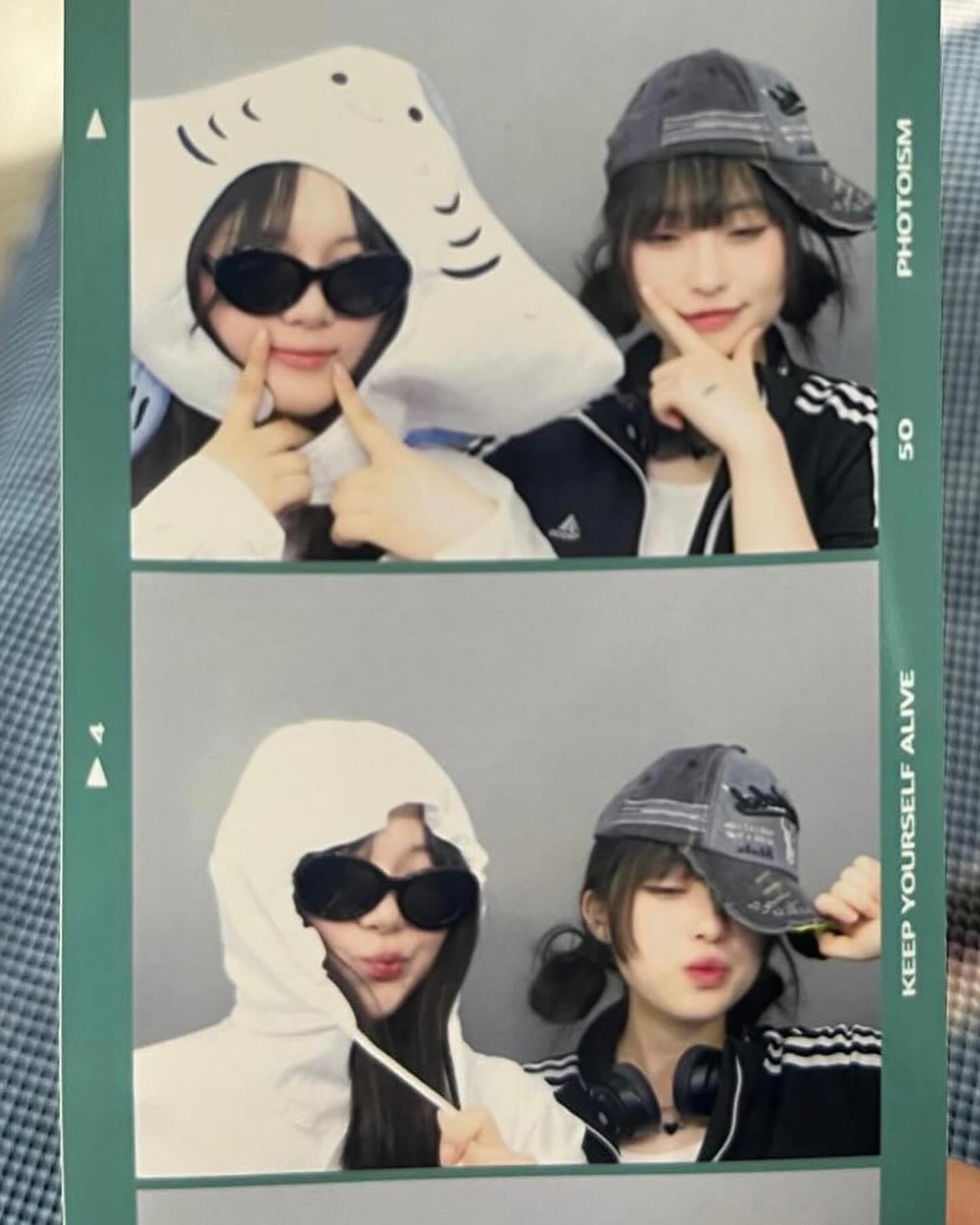 the image captures two young women posing playfully in a photo booth. the top photo features one girl wearing a whimsical stingray hat while the other flashes a peace sign. both sport trendy sunglasses. in the bottom image, the mood shifts slightly as one dons a hoodie over her head, while the other playfully holds a cap. the consistent elements across both photos are their shared smiles and affectionate poses, emphasizing their close bond. the setting suggests a lighthearted and fun outing, capturing a moment of friendship.