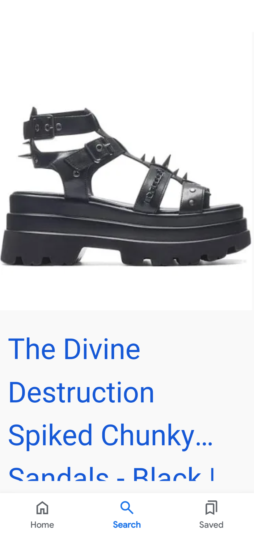 a pair of black chunky platform sandals with spikes. the sandals are made of leather and have a buckle closure. the platform is thick and chunky, and the spikes are on the straps and the platform.