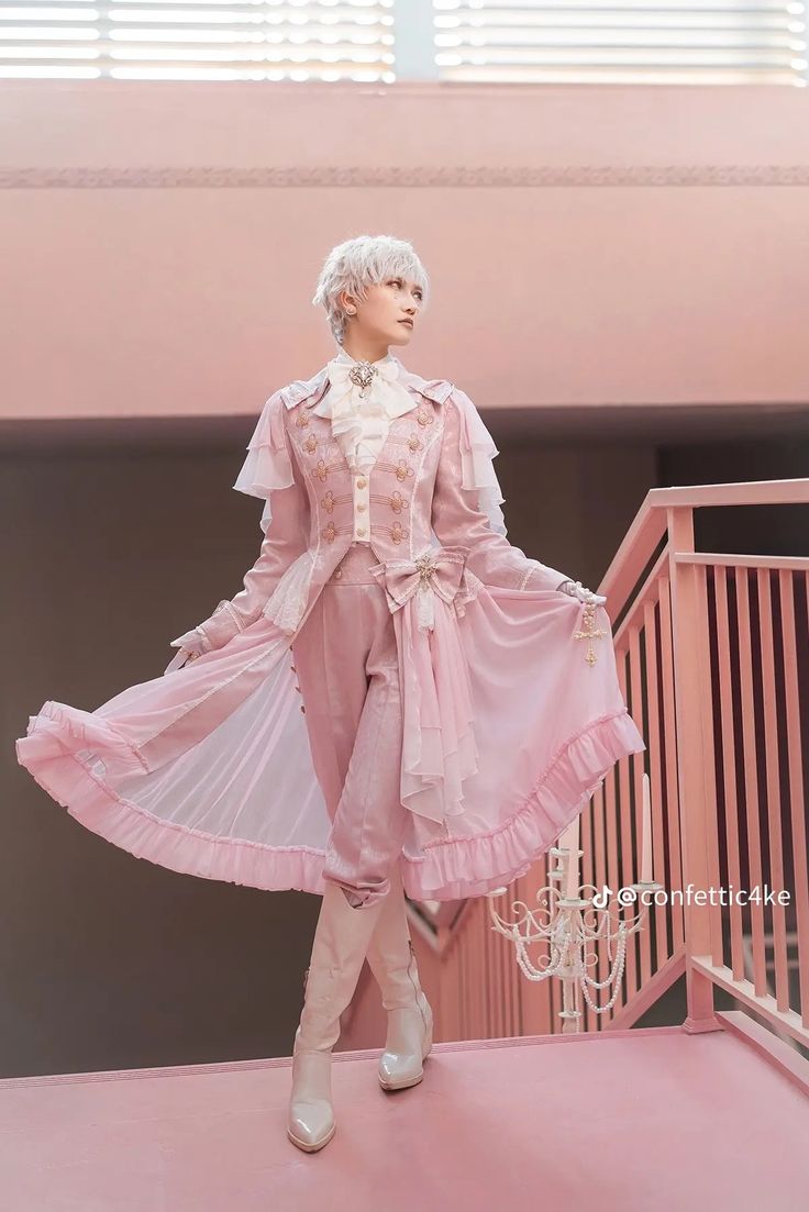 fulllength shot of a person wearing a stunning pink lolitastyle dress.  the dress is intricately detailed with lace, ruffles, and ornate embellishments. it has a rococo or aristocratic feel. the model, with short white hair, poses gracefully on a pink staircase.  the overall scene is pastel and very feminine. the setting appears to be a stylish indoor photoshoot.  the model wears white boots that match the overall light and airy aesthetic.