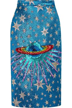 a blue skirt with a colorful eye design in the center. it is covered in silver glitter stars and appears to be made of sequins.