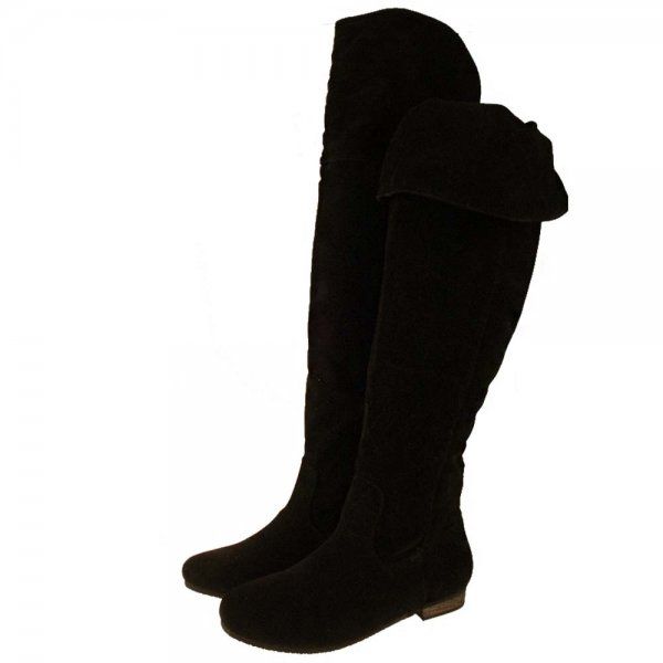 two black suede kneehigh boots, one standing straight up and the other with the top folded over.