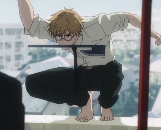 a young man with blond hair and glasses crouches on a rooftop, holding a large axe in his mouth. he is barefoot and wears a white shirt and dark pants. the perspective is from a low angle, looking up at him. the background suggests a city setting during the day.