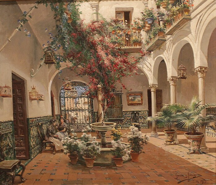 the image is an oil painting depicting a traditional courtyard. a central fountain surrounded by potted white flowers and a flowering tree with red blooms stands in the middle of a bricktiled courtyard. to the left, a woman sits on a bench along a tiled wall, with ornate wooden doors nearby. arched openings supported by columns line one side of the courtyard, leading to a balcony with potted plants and flowers. various birdcages are hanging around the courtyard. a wrought iron gate is visible in the background. the painting style is reminiscent of realist or impressionist art.