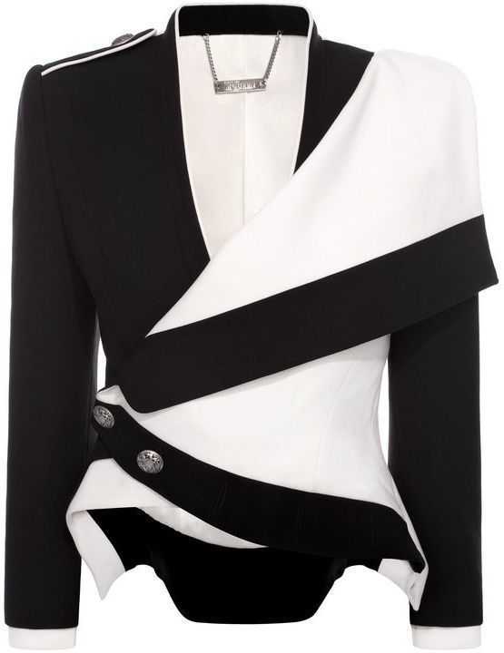 a black and white women's blazer featuring an asymmetrical design with bold stripes and silver buttons. the blazer has a structured and tailored fit, with one side black and the other white, incorporating a shoulder detail. a silver chain is visible at the neckline.