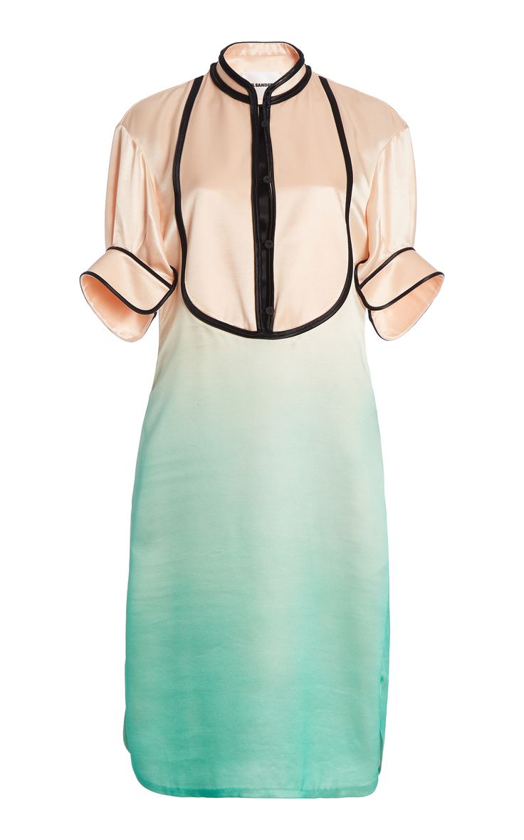 a silk dress with a pink and green ombre pattern. it features a black collar and button up front, short sleeves with black piping, and a black trim around the neckline. the dress has a casual style and is perfect for summer.