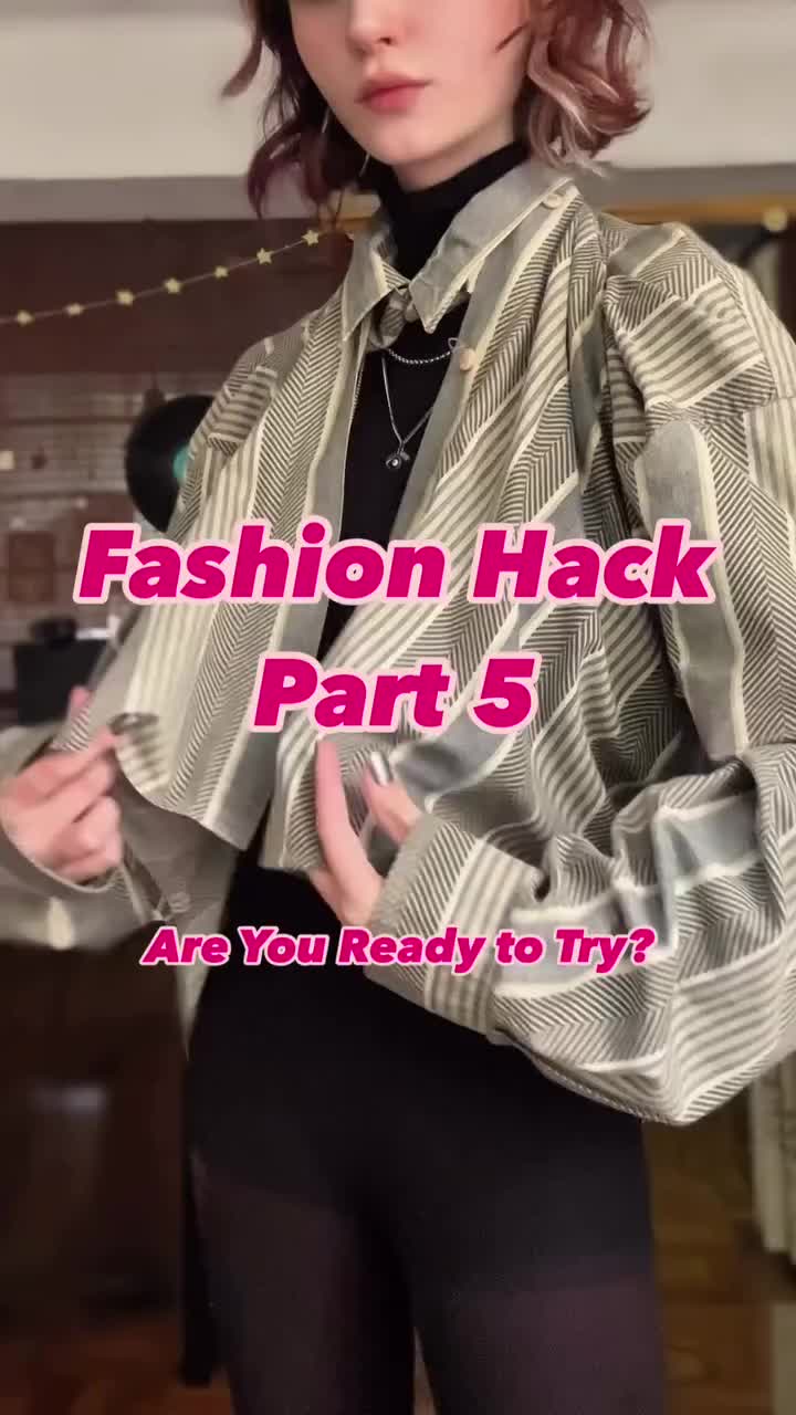 a woman wearing a gray and white button up shirt, black turtleneck, black tights and a necklace stands in front of a camera with the words "fashion hack part 5" and "are you ready to try?" superimposed on the image.